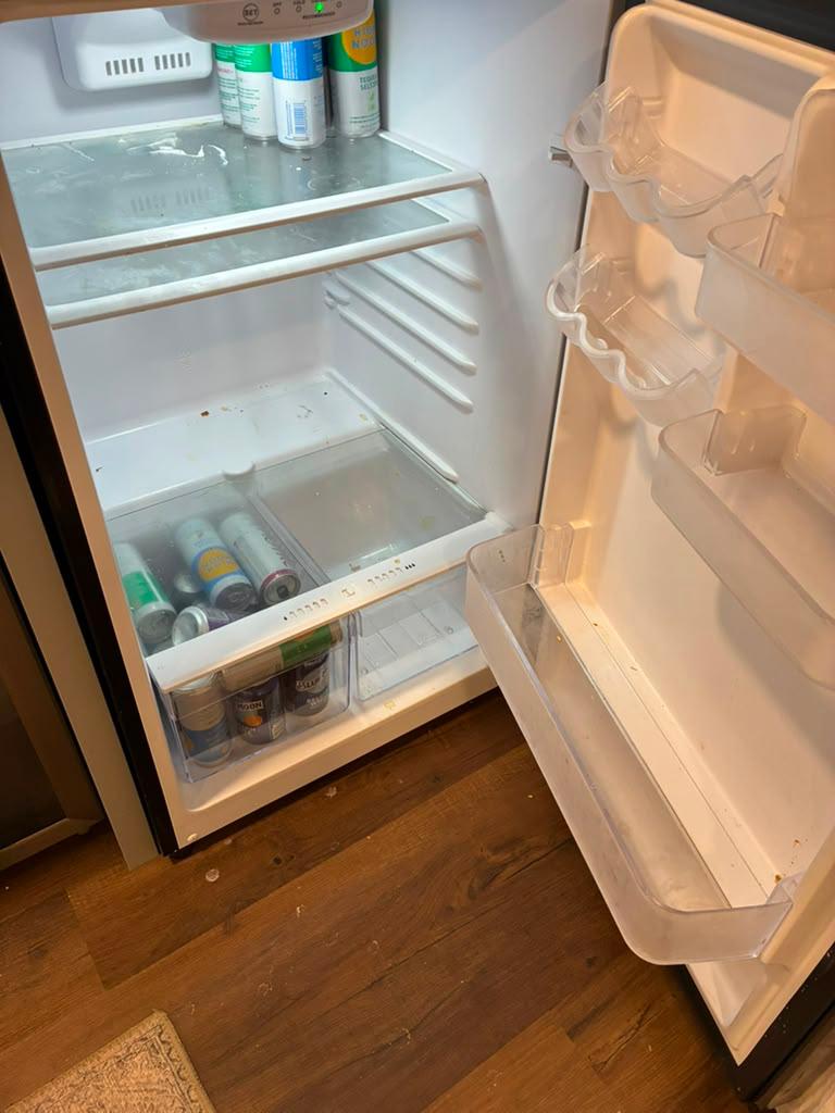 Full refrigerator deep clean, before